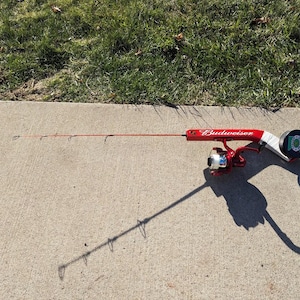 blows into a fishing reel How to Spool New Fishing Line Onto a Reel Step-by-Step