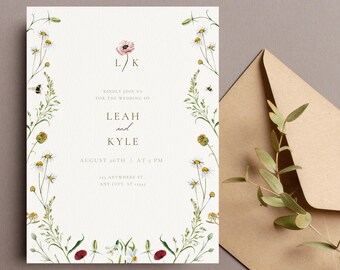 May include: Wedding invitation with a floral border and the text "L/K" in the center. The invitation reads "Kindly join us for the wedding of Leah and Kyle, August 26th at 5 PM, 123 Anywhere St, Any City, ST."