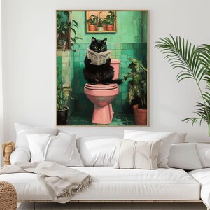 May include: A black cat sits on a pink toilet in a green tiled bathroom, reading a newspaper titled "Chronicle".