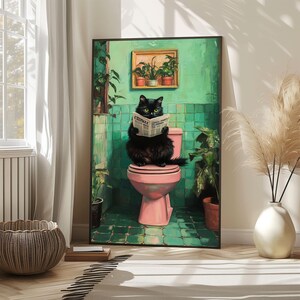 May include: A black cat sitting on a pink toilet in a bathroom with green tile walls. The cat is reading a newspaper titled "Chronicle".