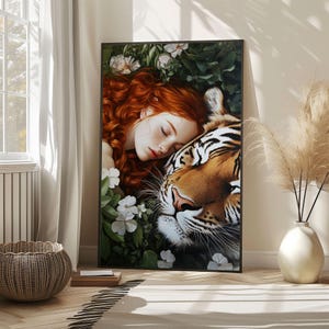May include: A painting of a woman with long red hair sleeping with her head resting on a tiger's head. The tiger has black stripes and a white background. The woman is wearing a white dress and has her eyes closed. The background is a lush green forest with white flowers.