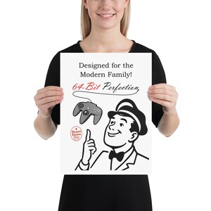 May include: A poster with a retro design featuring a smiling man in a suit and bow tie pointing upwards. The poster includes a game controller and text that reads "Designed for the Modern Family! 64-Bit Perfection."