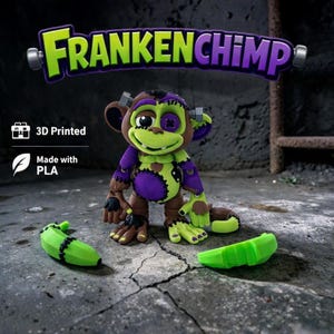 May include: A 3D printed FrankenChimp figure made with PLA, featuring a brown, purple, and lime green monkey with stitched details, bolts on its head, and a button eye. Two lime green banana segments are positioned on the ground nearby.