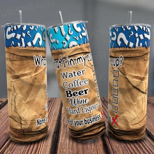 May include: Three stainless steel tumblers with a brown paper bag design. The tumblers have a blue and white question mark pattern on the top and bottom. The text on the tumblers reads "What's in my cup?" "Water, Coffee, Beer, Wine, Hard Liquor" and "None of your business".