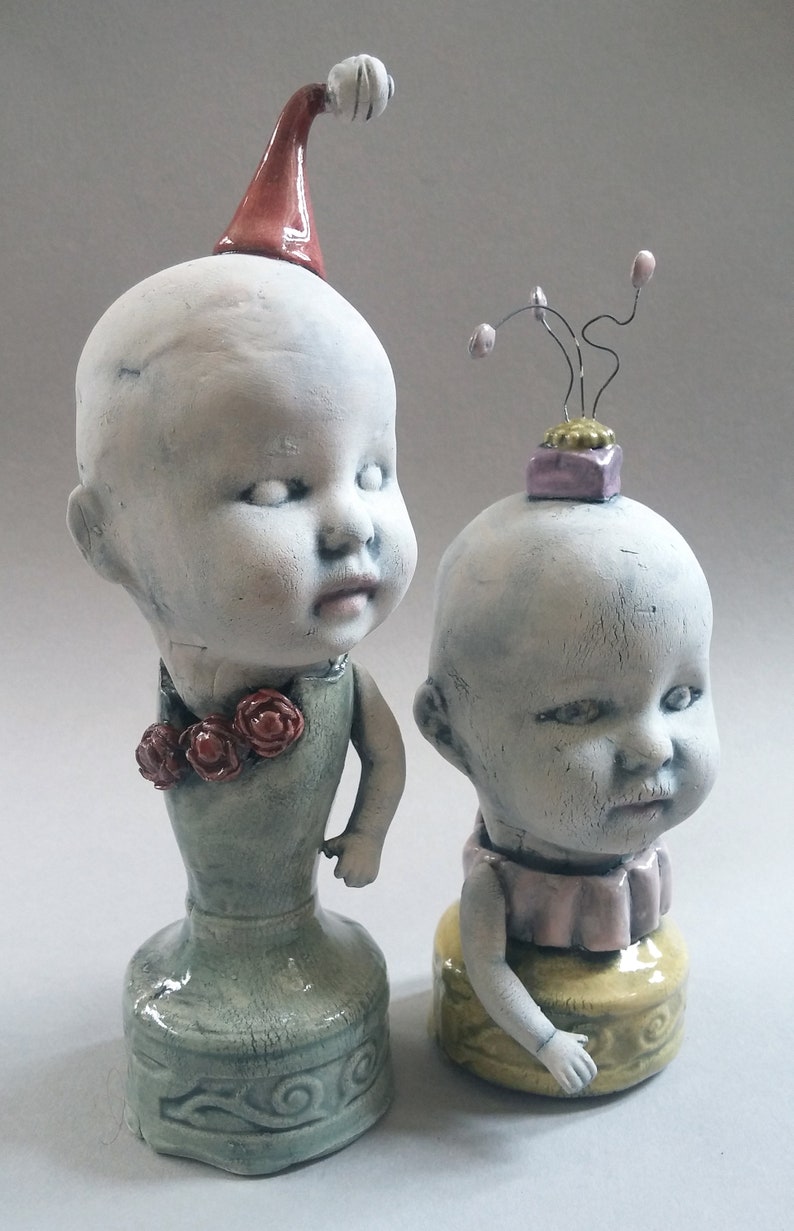 ceramic sculpture 7.5 x 2.5 x 2.5 Baby doll sculpture small ceramic sculpture Celadon Pillar