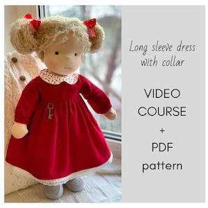 May include: A red long-sleeved dress with a white collar and lace trim. The dress is being worn by a doll with blonde hair and red bows. The text "Long sleeve dress with collar VIDEO COURSE + PDF pattern" is visible in the image.