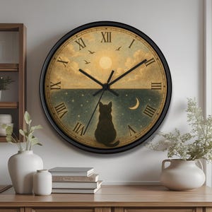 May include: A circular wall clock with a black frame. The clock face depicts a cat silhouette looking at a moon and stars over the sea. The clock hands are black, and the numerals are Roman. The background is a warm, vintage-style illustration.