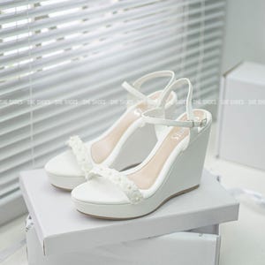 Wedge wedding sandals for brides. Super cute, comfortable wedge wedding shoes for brides. High-end designer wedding shoes.