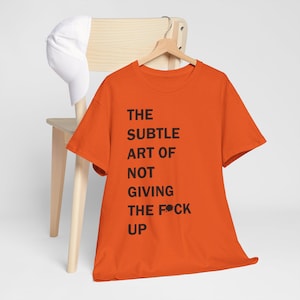 The Subtle Art of Not Giving Up Unisex Heavy Cotton Tee