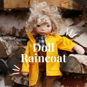 May include: A handmade doll wearing a bright yellow raincoat with a hood and pockets. The doll has curly blonde hair, rosy cheeks, and is dressed in a plaid shirt and brown pants. The text "Doll Raincoat" is displayed on the image.
