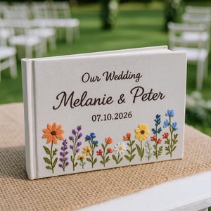 Embroidered Floral Wedding Guest Book, Personalized Linen Keepsake with Custom Names & Date, Hand‑Stitched Wildflowers