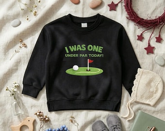 「今日は1アンダーパーだった」刺繍入りスウェットシャツ、1歳の誕生日ゴルフスウェットシャツ、男の子の1歳の誕生日衣装、ゴルフテーマの幼児用シャツ