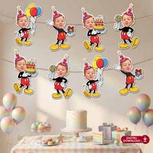 May include: A birthday party scene with Mickey Mouse-themed cutouts featuring a child's face, holding balloons, gifts, and cake. The decorations include a rainbow cake, cupcakes, and pastel balloons, creating a cheerful atmosphere.
