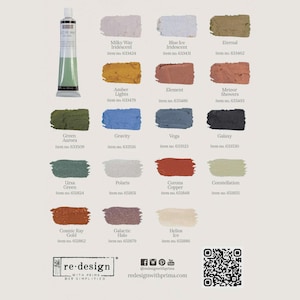 May include: An image shows a tube of green iridescent paint and a colour chart with 18 paint swatches. The swatches include colours such as "Milky Way Iridescent", "Amber Lights", "Green Aurora", and "Cosmic Ray Gold". The brand name "re-design" is visible.