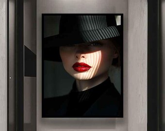May include: A framed art print featuring a woman wearing a black hat with a striped brim. The woman's face is partially obscured by shadows and light, with bright red lipstick. The artwork is displayed in a hallway.