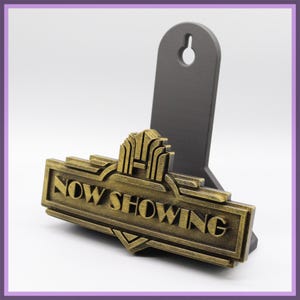 Now Showing - VHS/DVD wall Hanger (Free-stands on table too!)