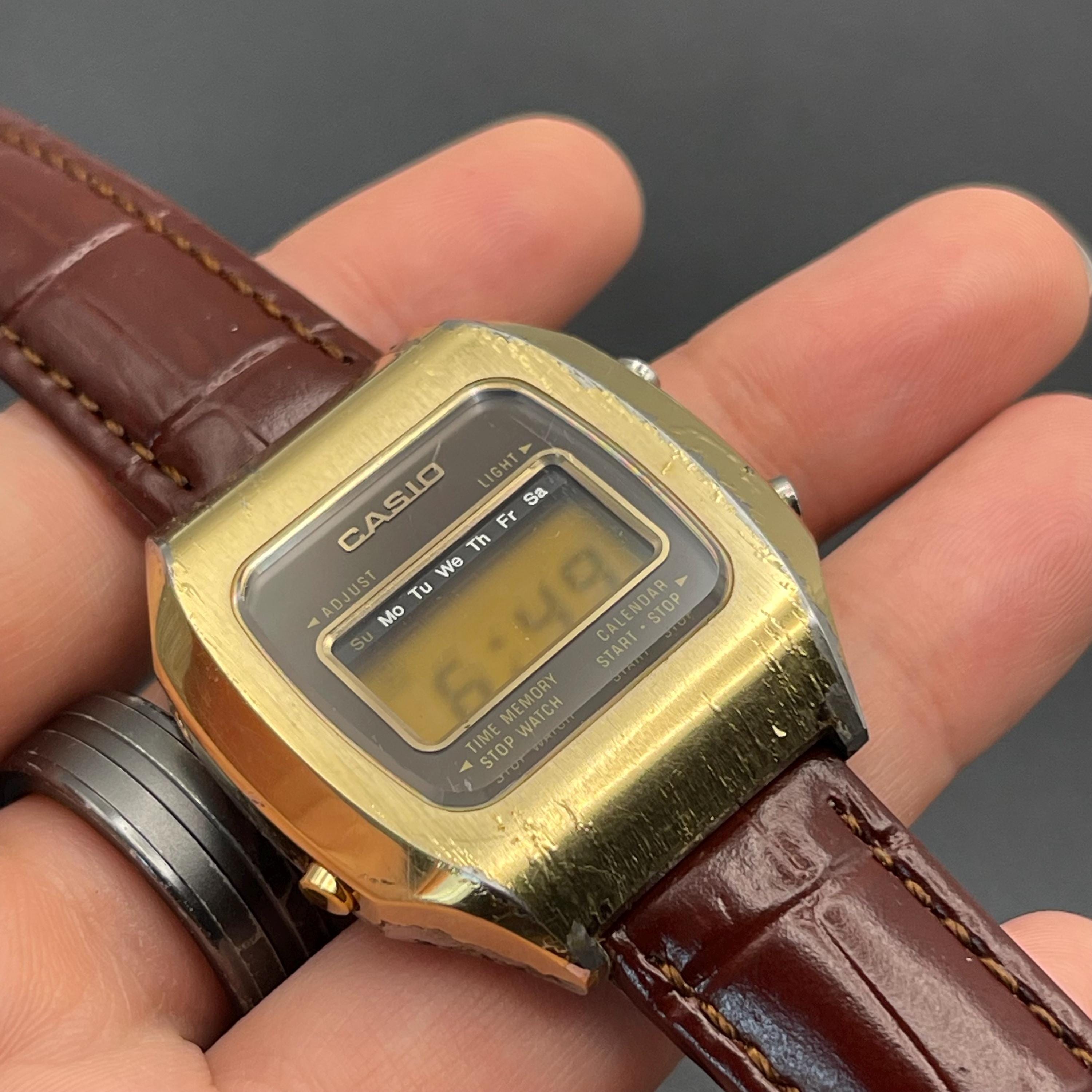 Vintage 1970s Casio Casiotron Digital Watch: Gold-tone, Brown
