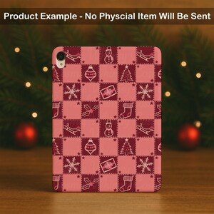 May include: A rectangular tablet case featuring a pink and dark red checkered pattern with white line art icons of snowmen, Christmas trees, snowflakes, gift boxes, stockings, and sleighs. The text Product Example - No Physcial Item Will Be Sent appears.