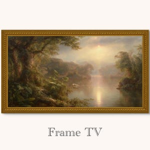 May include: A landscape painting in a gold frame, showing a river scene with trees and sunlight. The artwork has a gold-colored ornate frame, with the text "Frame TV" at the bottom.