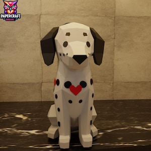 Puede incluir: Un perro dálmata de papel blanco y geométrico con manchas y orejas negras, y un diseño de corazón rojo. El perro está sentado erguido. El logotipo de Papercraft Dream está en la esquina superior izquierda.