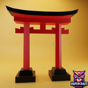 May include: A 3D model of a Japanese Torii gate, rendered in red with a black roof. The gate's geometric design stands out against a yellow backdrop. The image includes a logo in the bottom right corner, suggesting a papercraft theme.