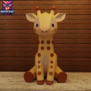 May include: A geometric papercraft giraffe in shades of tan and brown, with dark brown spots and accents. The giraffe is sitting, with its legs extended. The logo "PAPERCRAFT DREAM" is in the upper left corner.