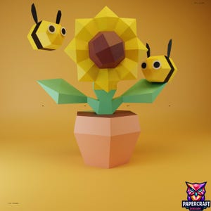 Puede incluir: Un girasol de papel con dos abejas, todo en un estilo geométrico. El girasol tiene pétalos amarillos y un centro marrón, con hojas y tallo verdes. Las abejas son amarillas y negras. La flor está en una maceta color melocotón sobre un fondo amarillo.
