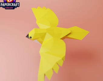 Peut inclure: Un oiseau en papier jaune en vol sur un fond rose. L'oiseau est fait de papier plié et a un design simple et géométrique.