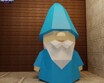 May include: A blue papercraft gnome with a white beard and a pointed hat. The gnome is standing on a tiled surface. The Papercraft Dream logo is in the upper left corner.
