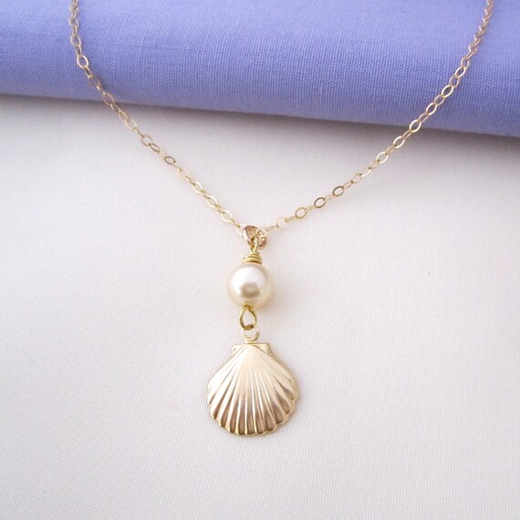Items similar to Beautiful Gold Seashell Necklace on Etsy