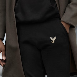 Jogginghose Unisex Bio Baumwolle, Oversized Sweathose, lässige Hose, sportliche Jogging Pants, nachhaltig & bequem, Phönix Motiv vorne