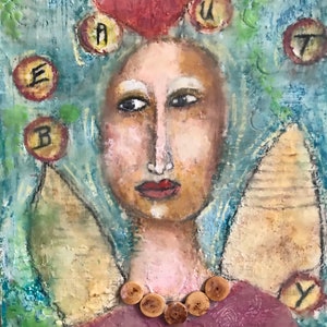 May include: Mixed media artwork of a stylized face with a red heart above the head. The face has a neutral expression, with a button necklace and angel wings. The background is a mix of blue, green, and white, with the letters "E", "B", "A", "U", and "Y" in circles.
