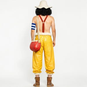 May include: A set of three ceramic nesting bowls in shades of blue, green, and white. The bowls feature a speckled glaze and a simple, modern design. The largest bowl is approximately 6 inches in diameter.