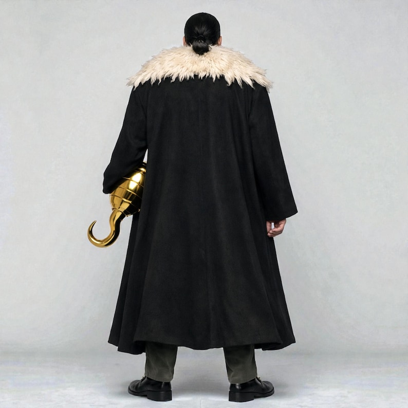 May include: A black coat with a cream-colored fur collar. A gold-colored hook is held in the left hand. The person is wearing dark pants and black shoes. The image is taken from the back.