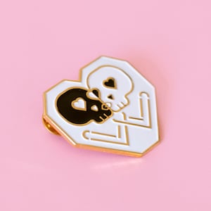 DISOUNTED: Kissing Skulls Gold enamel pin image 1