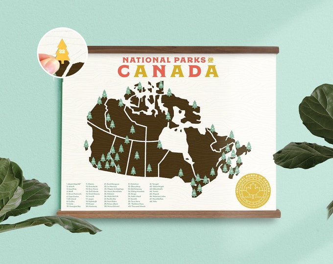 Carte des parcs nationaux du Canada imprimée avec des autocollants d'arbre et un cadre pour garder une trace de vos voyages