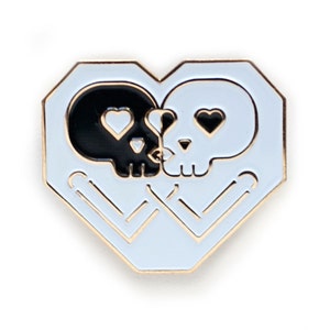 DISOUNTED: Kissing Skulls Gold enamel pin image 3