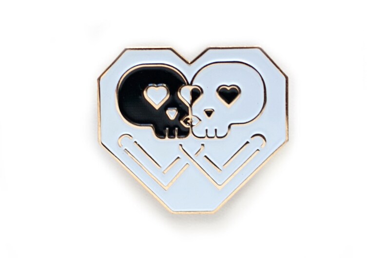 DISOUNTED: Kissing Skulls Gold enamel pin image 3