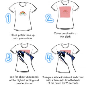 May include: Four step instructions on how to iron on a patch to a t-shirt. The first step shows a t-shirt with a rainbow patch placed face up on the fabric. The second step shows a thin cloth covering the patch. The third step shows an iron being pressed onto the patch. The fourth step shows the t-shirt turned inside out with the iron being pressed onto the back of the patch.