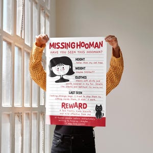 May include: A humorous poster with the text "MISSING HOOMAN" and a cartoon illustration of a person. The poster includes details like height, weight, and clothes, along with a reward offer. A black cat illustration is also present.