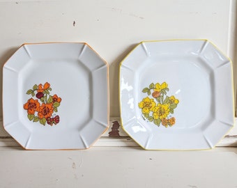 Set of Three Vintage Flower Plates in Yellow, Orange, and Purple