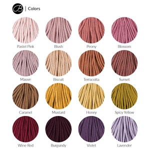 May include: A color chart featuring sixteen circular swatches of braided cord in various shades including Pastel Pink, Blush, Peony, Blossom, Mauve, Biscuit, Terracotta, Sunset, Caramel, Mustard, Honey, Spicy Yellow, Wine Red, Burgundy, Violet, and Lavender.