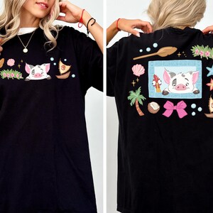 The image is a collage of two photos showing a woman wearing a black t-shirt with a cartoon pig design and various colorful illustrations on the back.