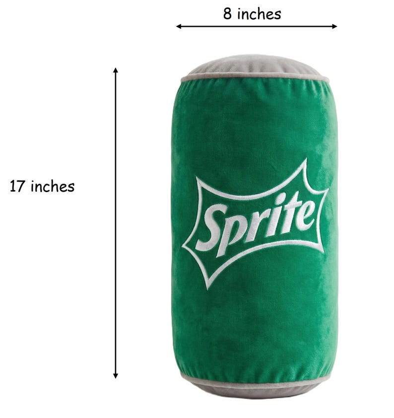 A green plush toy resembling a can of Sprite, with the word "Sprite" printed on it. The toy is described as being 8 inches tall and 17 inches wide.
