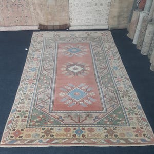 Handmade Vintage Turkish Rug 5x7 ft: Anatolian Wool Medallion