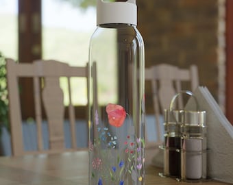 Mooie bloemenwaterfles. Waterflessen. Drankflessen. Bloemencadeaus. Cadeaus voor tuinders. Tuinieren geschenken. Tuinieren. Cadeaus. Bloemen.