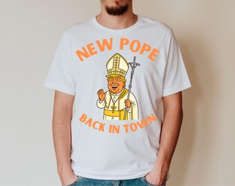 Funny Donald Trump Pope T-Shirt, New Pope Back in Town Tee, Political Humor Graphic Tee, Satirical Gift for Men and Women