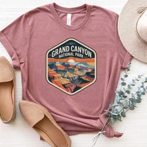 Grand Canyon National Park Tee With Vibrant Sunset View, Rock Formations, and Iconic Layered Canyon Design