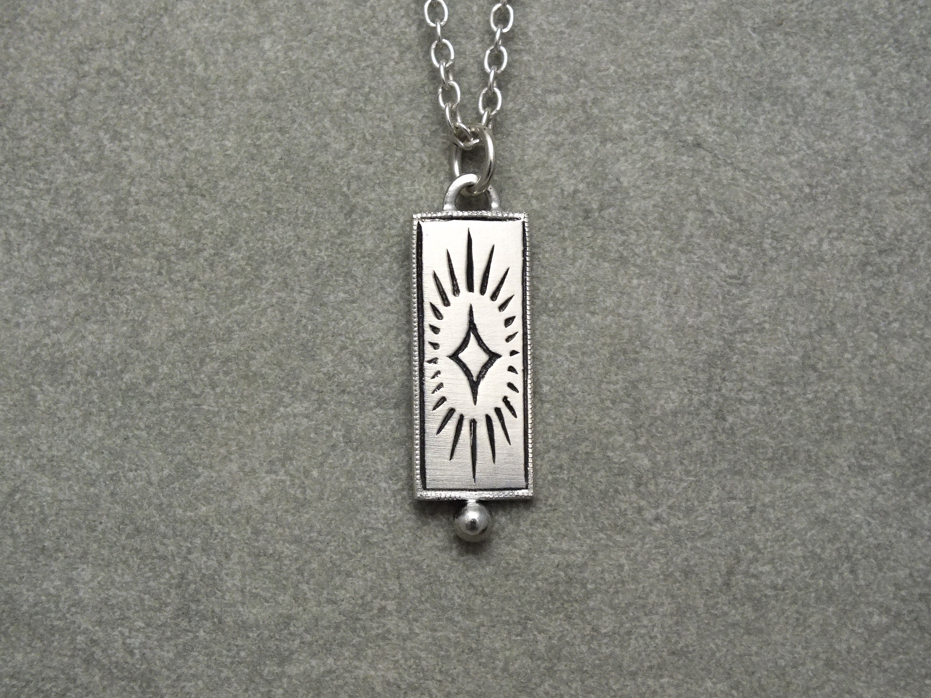 Sterling Silver Medallion Necklace: Celestial Starburst Talisman