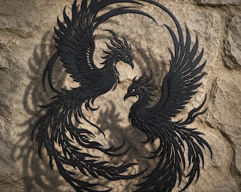 May include: A black metal wall art piece featuring two phoenixes facing each other in a circular formation. The birds have intricate, sharp-edged feathers and long, flowing tails that curve to create a continuous, balanced, and symmetrical design.